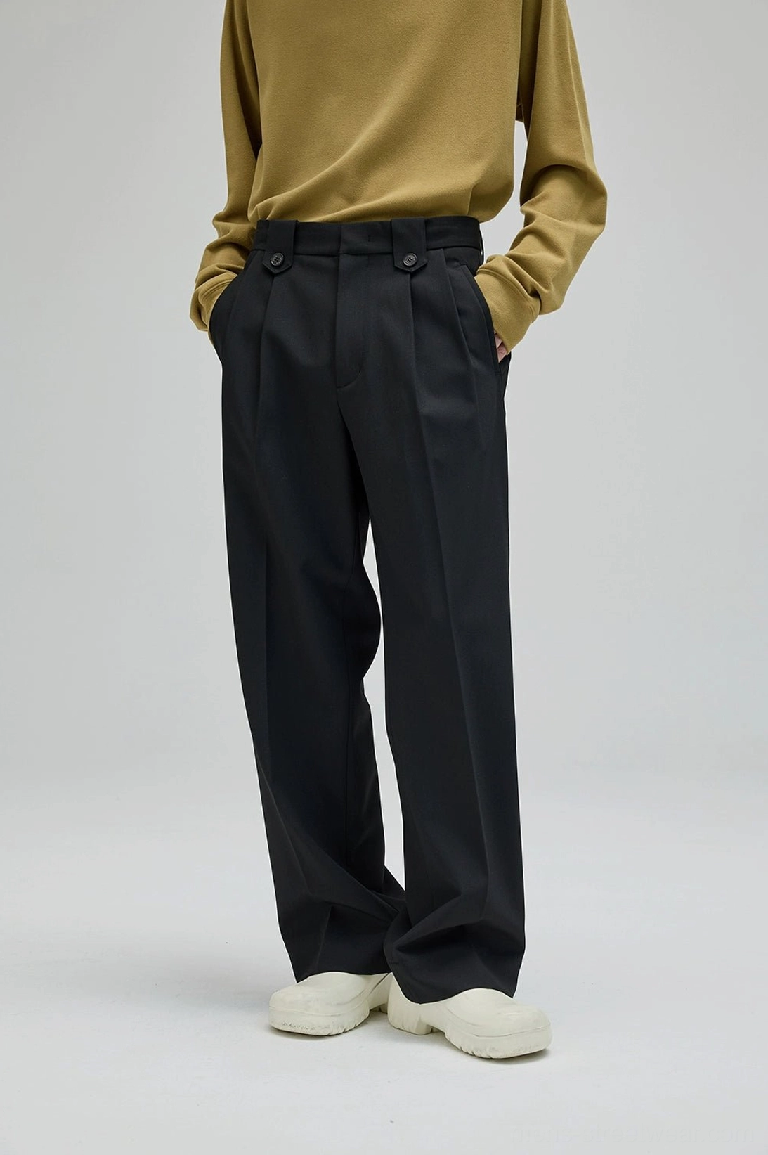 Black wide leg suit pants styled with mustard yellow top in relaxed Korean streetwear outfit