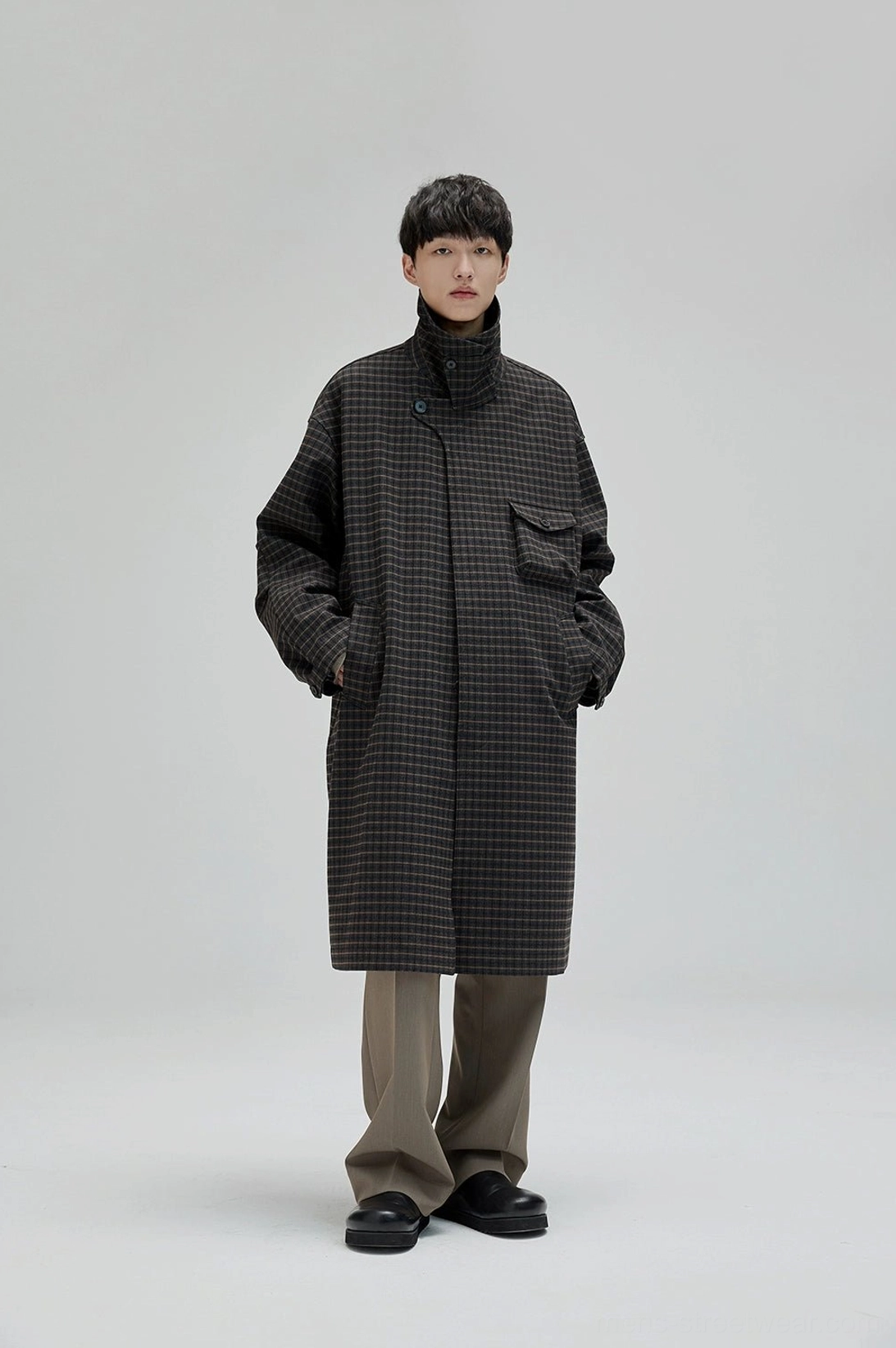 Relaxed straight wide leg suit pants designed for layered shirts knitwear and modern streetwear looks