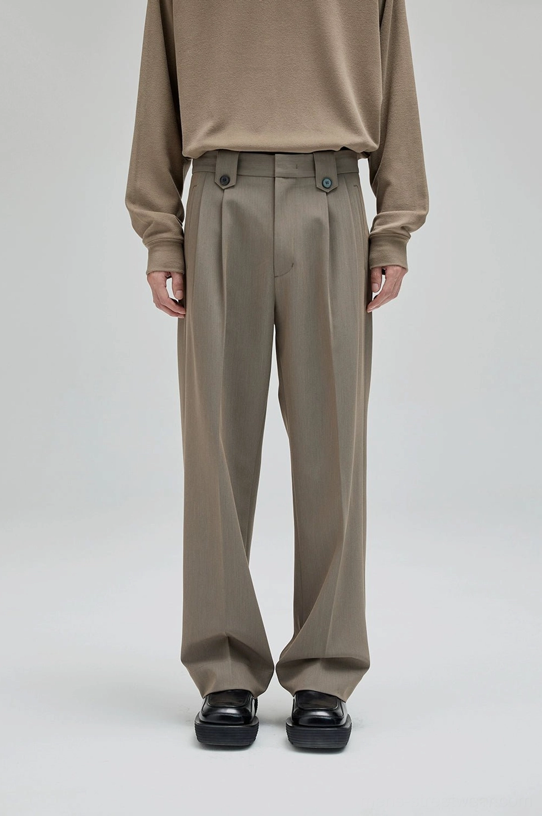 Relaxed mens wide leg suit pants with clean tailoring details and comfortable flexible fabric blend
