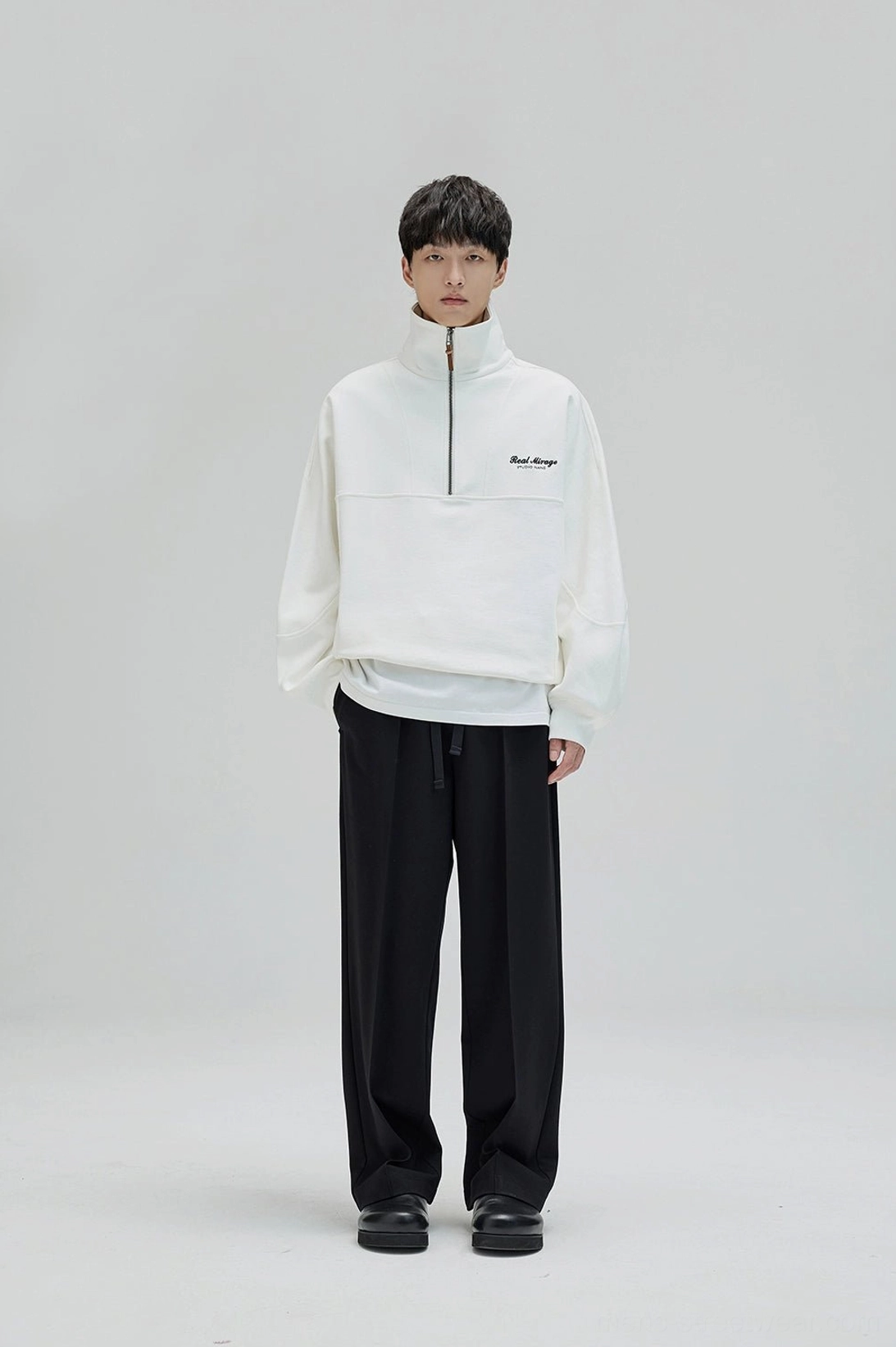 Modern Korean wide leg suit pants with structured waistband and flowing oversized trouser shape