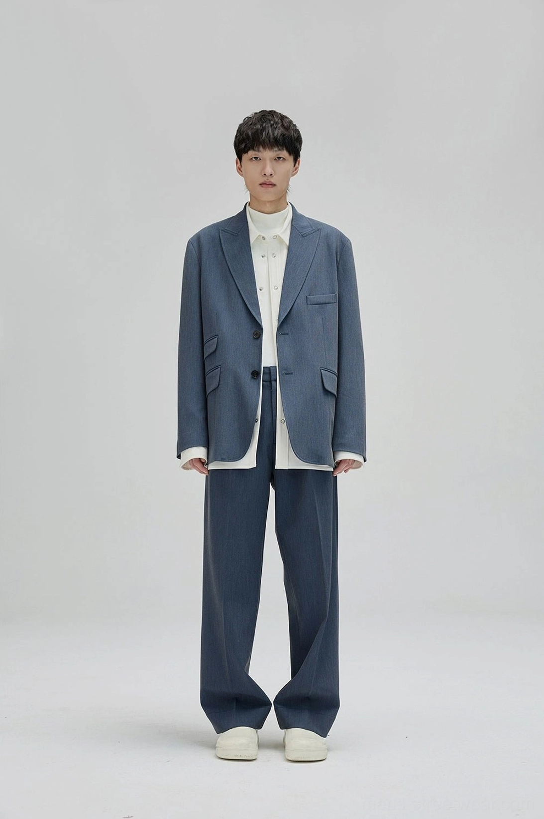 Relaxed tailored wide leg pants with vintage suiting influence and versatile everyday styling