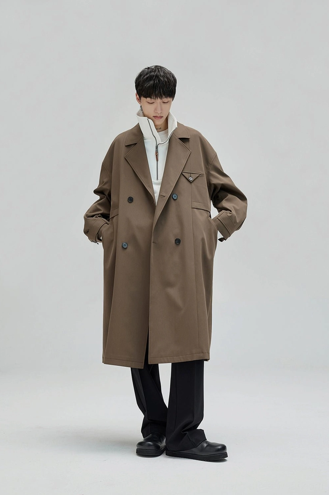 Contemporary wide leg tailored pants with pleats and vintage-inspired waistband for mens streetwear