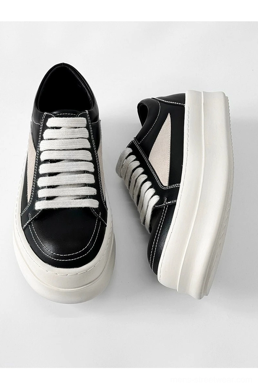 Elevated sole streetwear sneakers with structured panels for wide-leg jeans and cargo pants