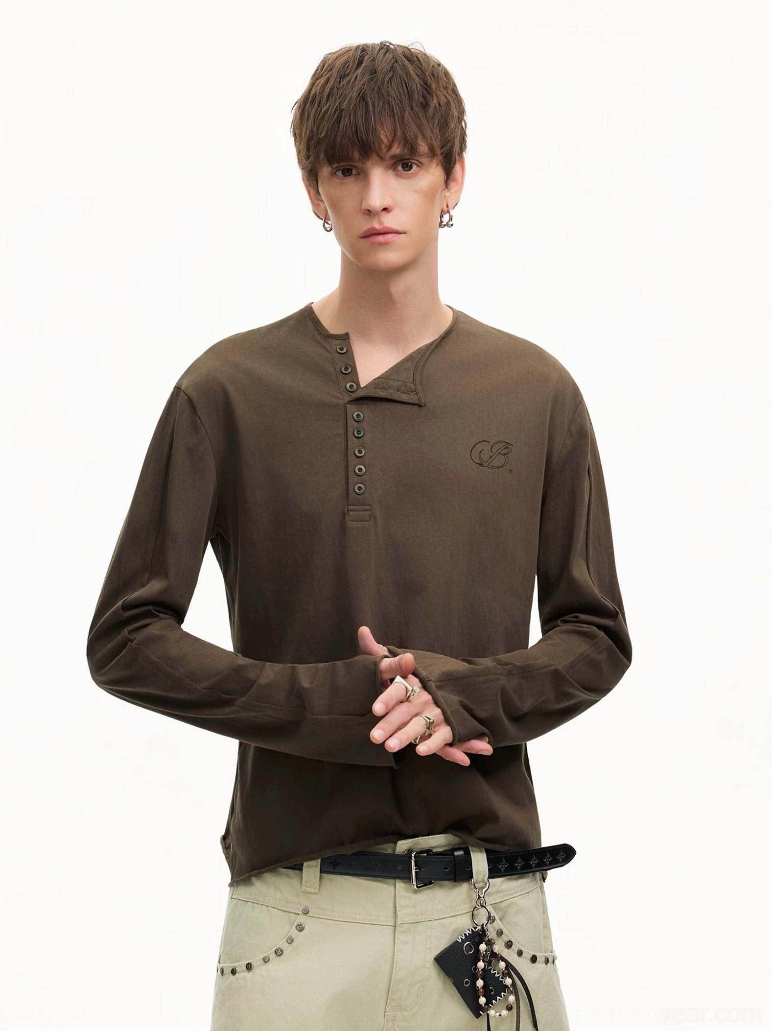 Espresso brown Korean streetwear Henley shirt styled with light khaki trousers, black leather belt, and waist accessories