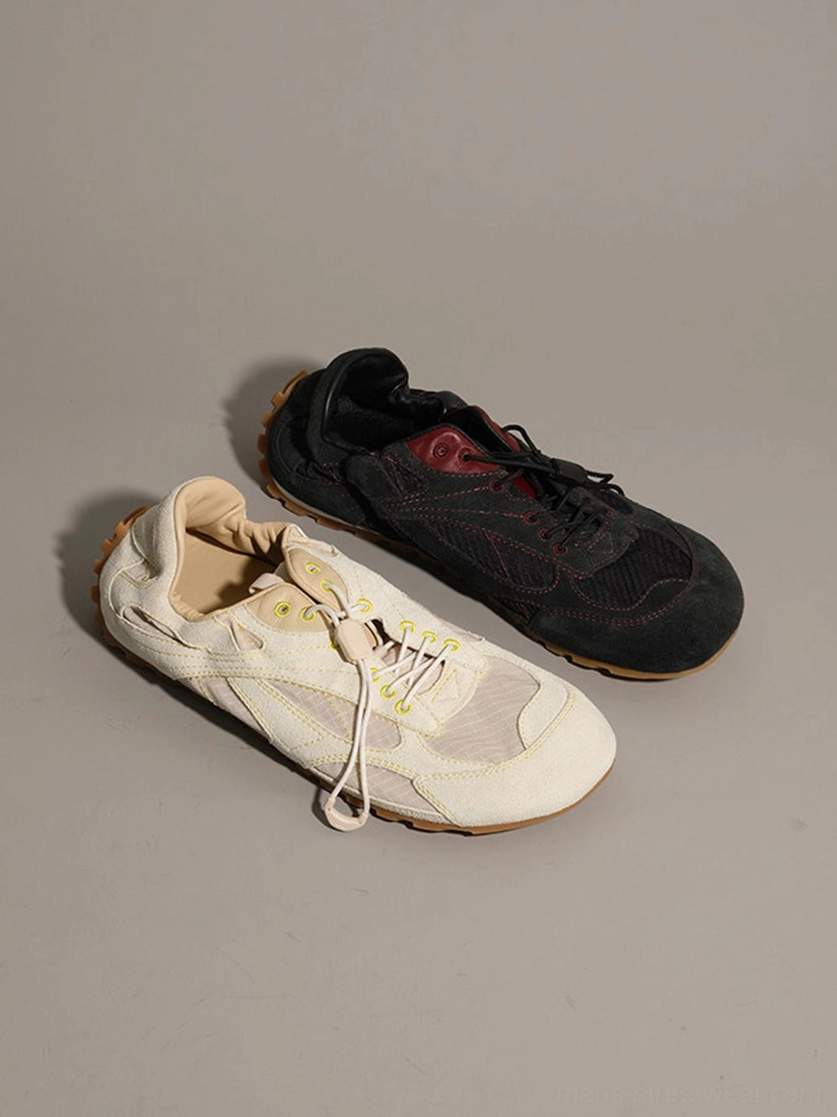 Everyday unisex paneled nubuck street sneakers in black and white with durable ridged gum outsole