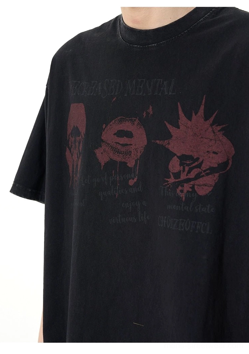 Close up front detail of faded black cotton blend graphic tee showing maroon distressed artwork and worn-in fabric texture