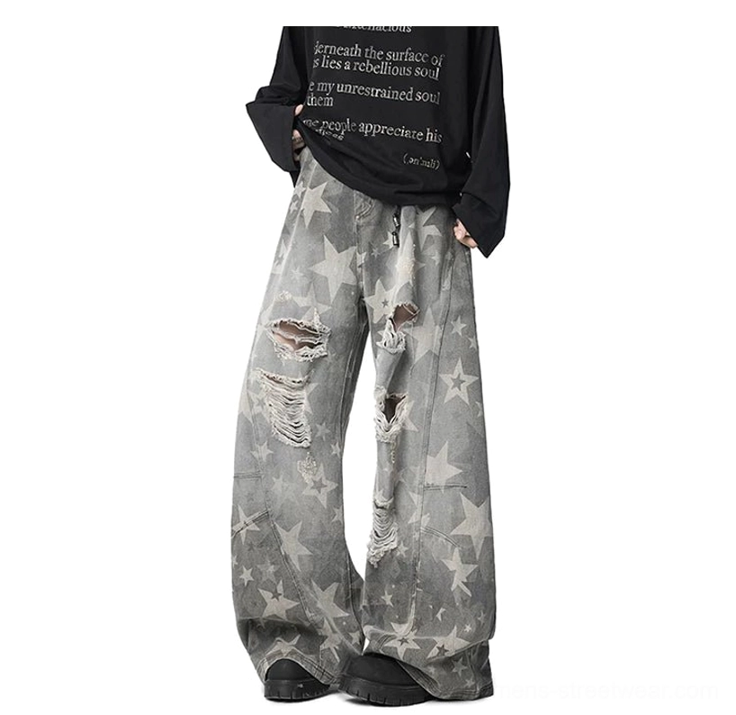 Faded grey distressed star print wide leg denim jeans front three quarter streetwear outfit view