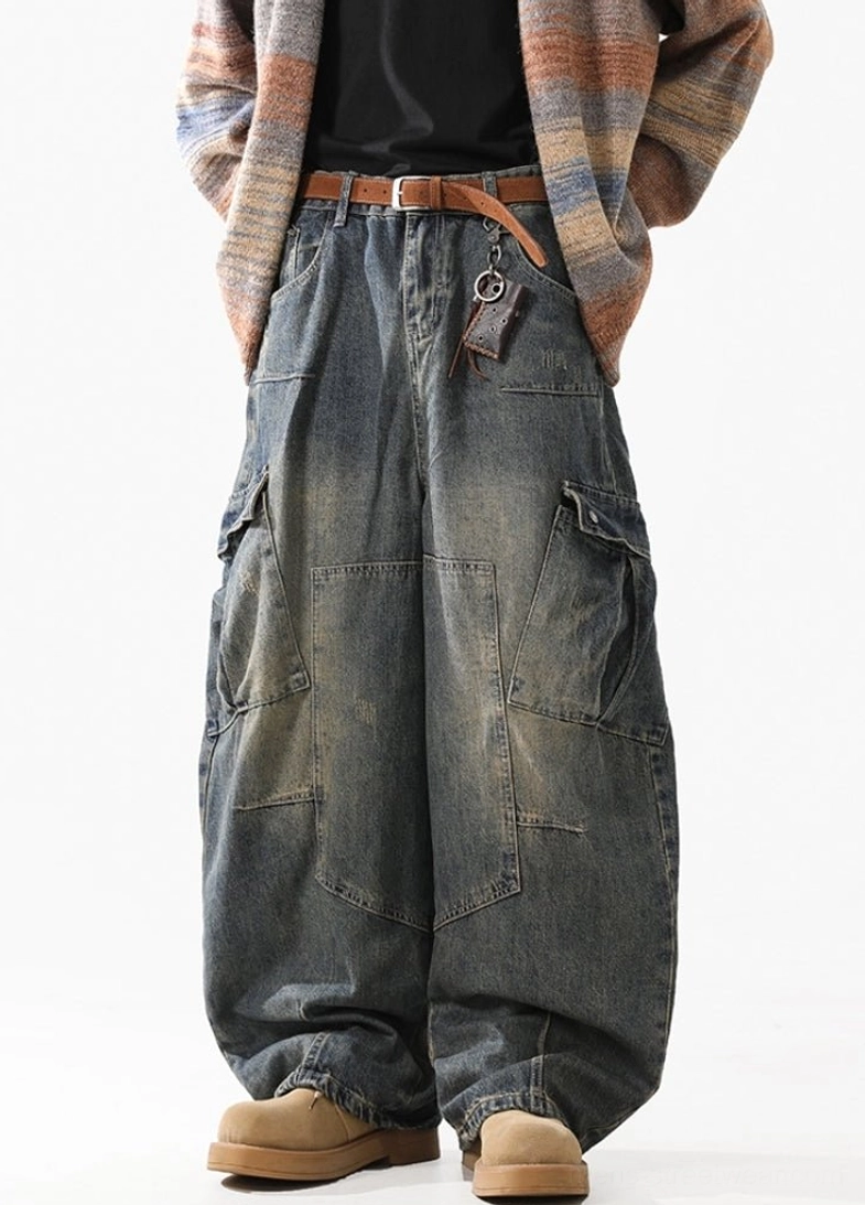 Faded yellow-blue washed baggy cargo jeans with oversized utility pockets and a loose silhouette for Korean streetwear outfits