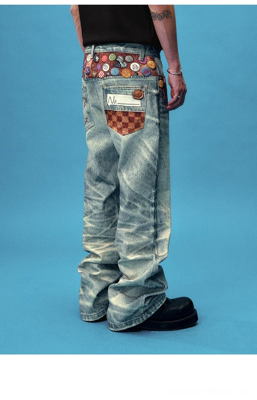 Close up side rear view of faded vintage denim wide leg jeans with checked back pocket and badge embellishments