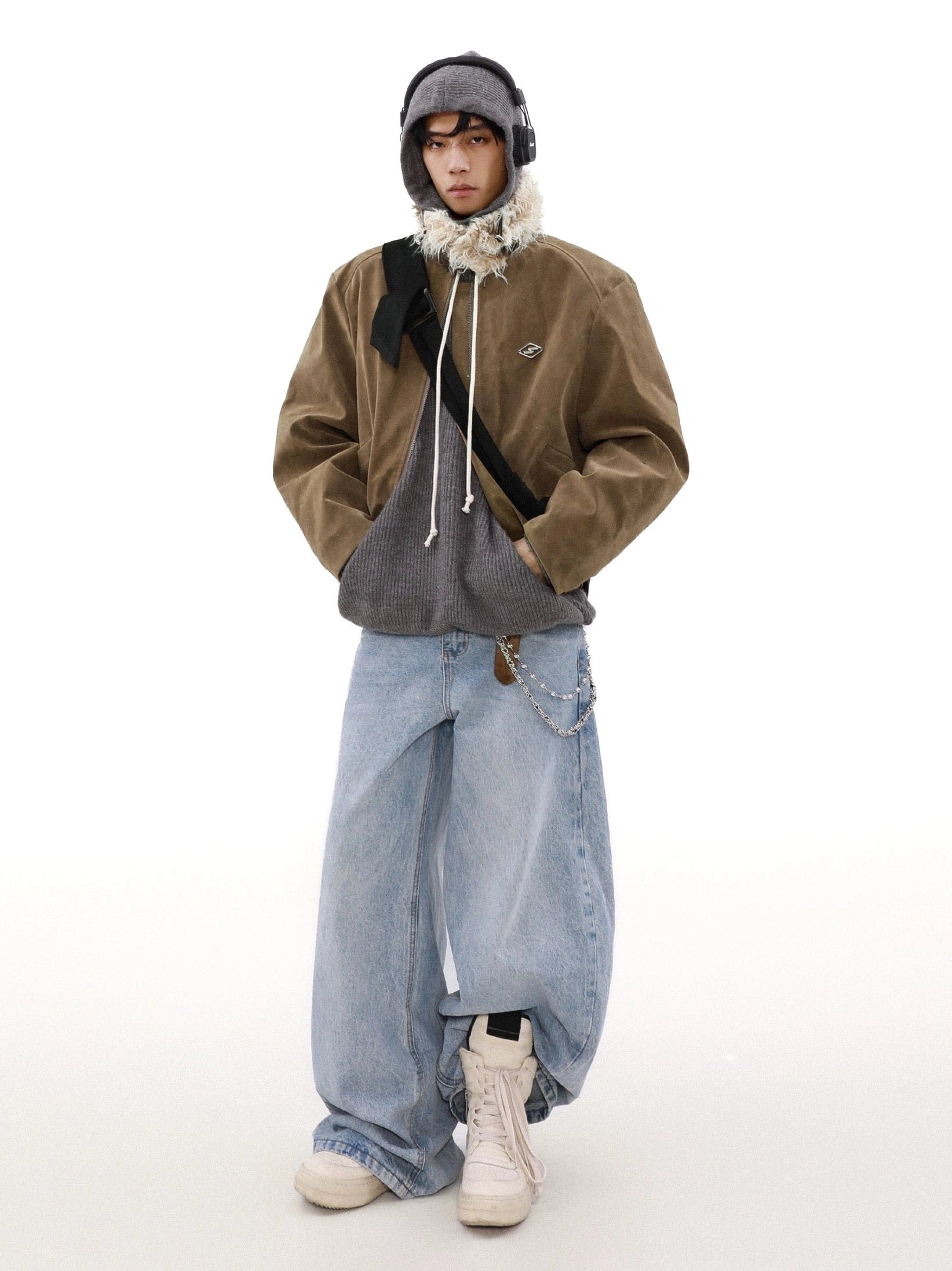 Dark brown faux fur collar suede bomber jacket full front view with loose blue denim jeans