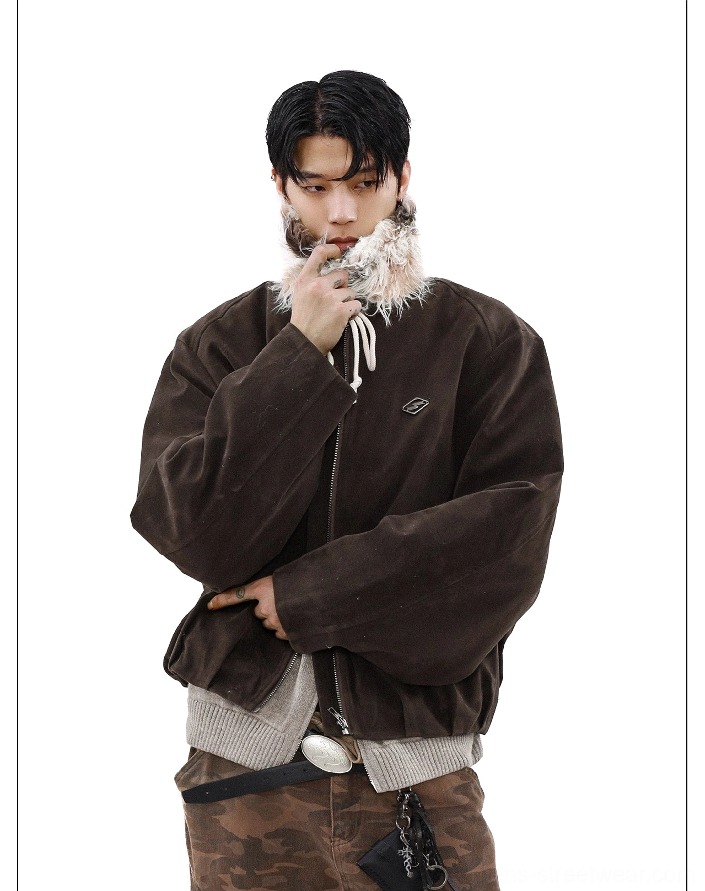 Side view of dark brown suede-look bomber jacket with oversized sleeves and elasticated ribbed hem