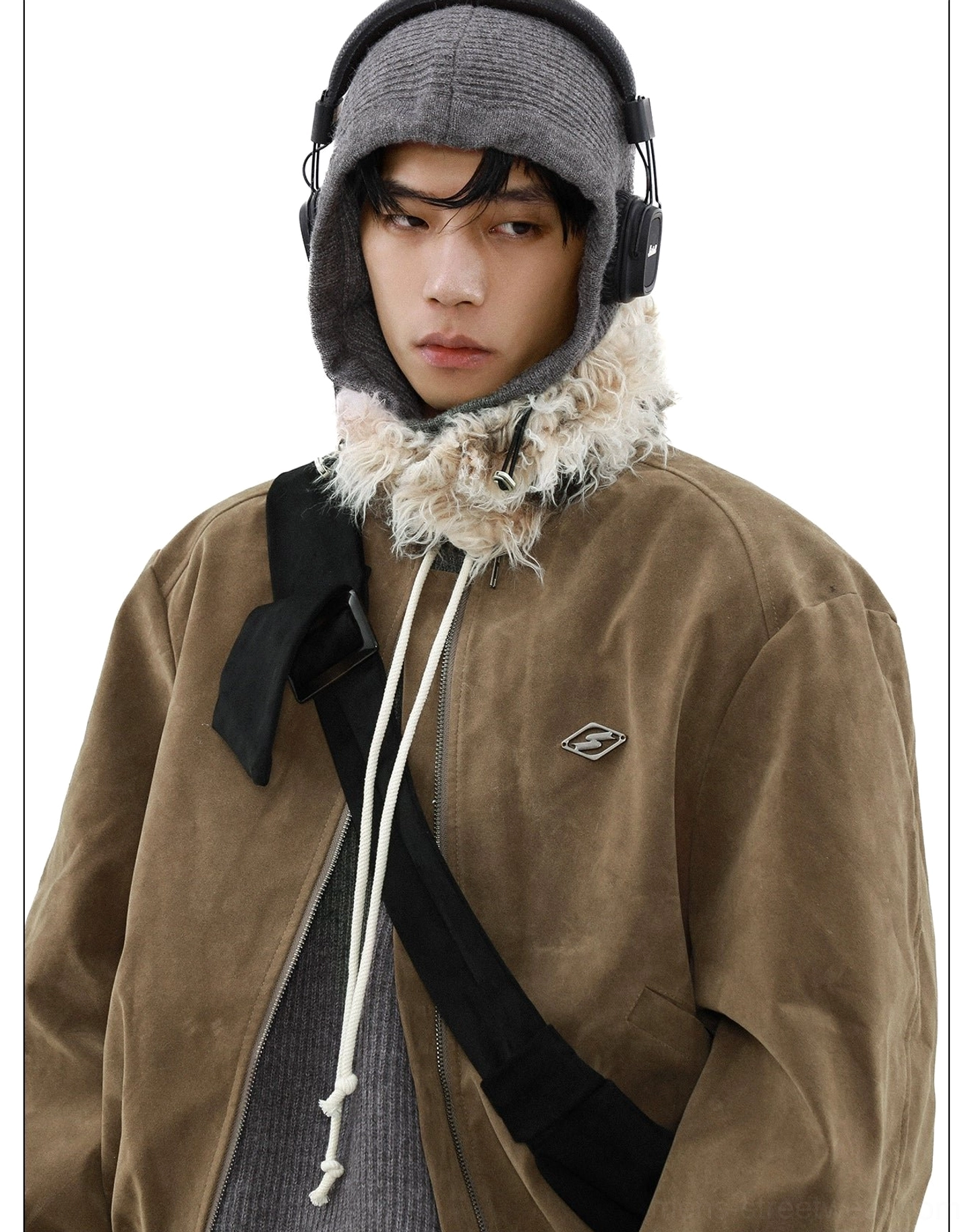 Faux fur collar suede bomber jacket material texture and winter outerwear construction detail