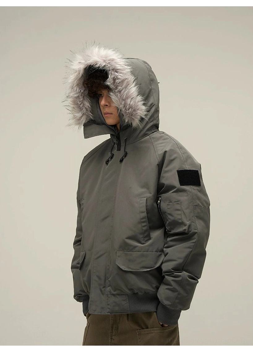 Dark grey faux fur hood puffer bomber jacket side view with ribbed cuff and flap pocket