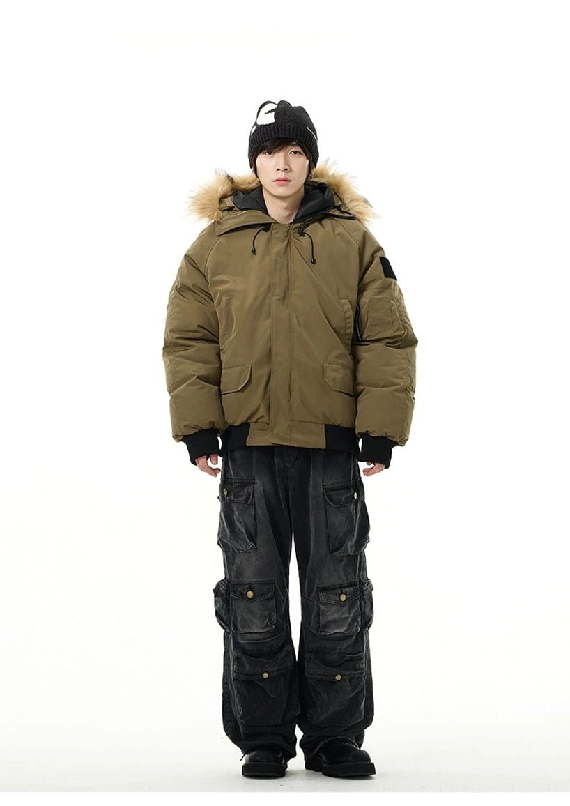 Military green faux fur hooded puffer bomber jacket front view styled with black cargo pants