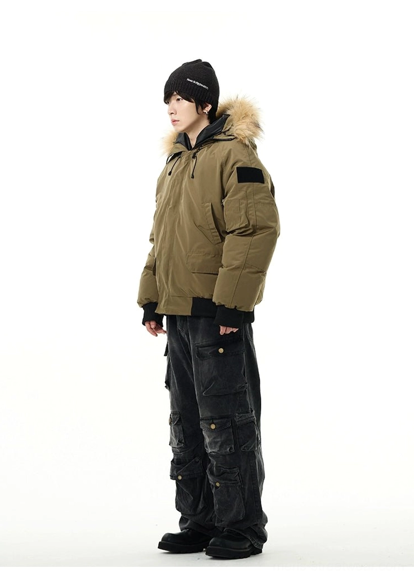 Military green faux fur hooded puffer bomber jacket side view showing ribbed hem and utility pockets