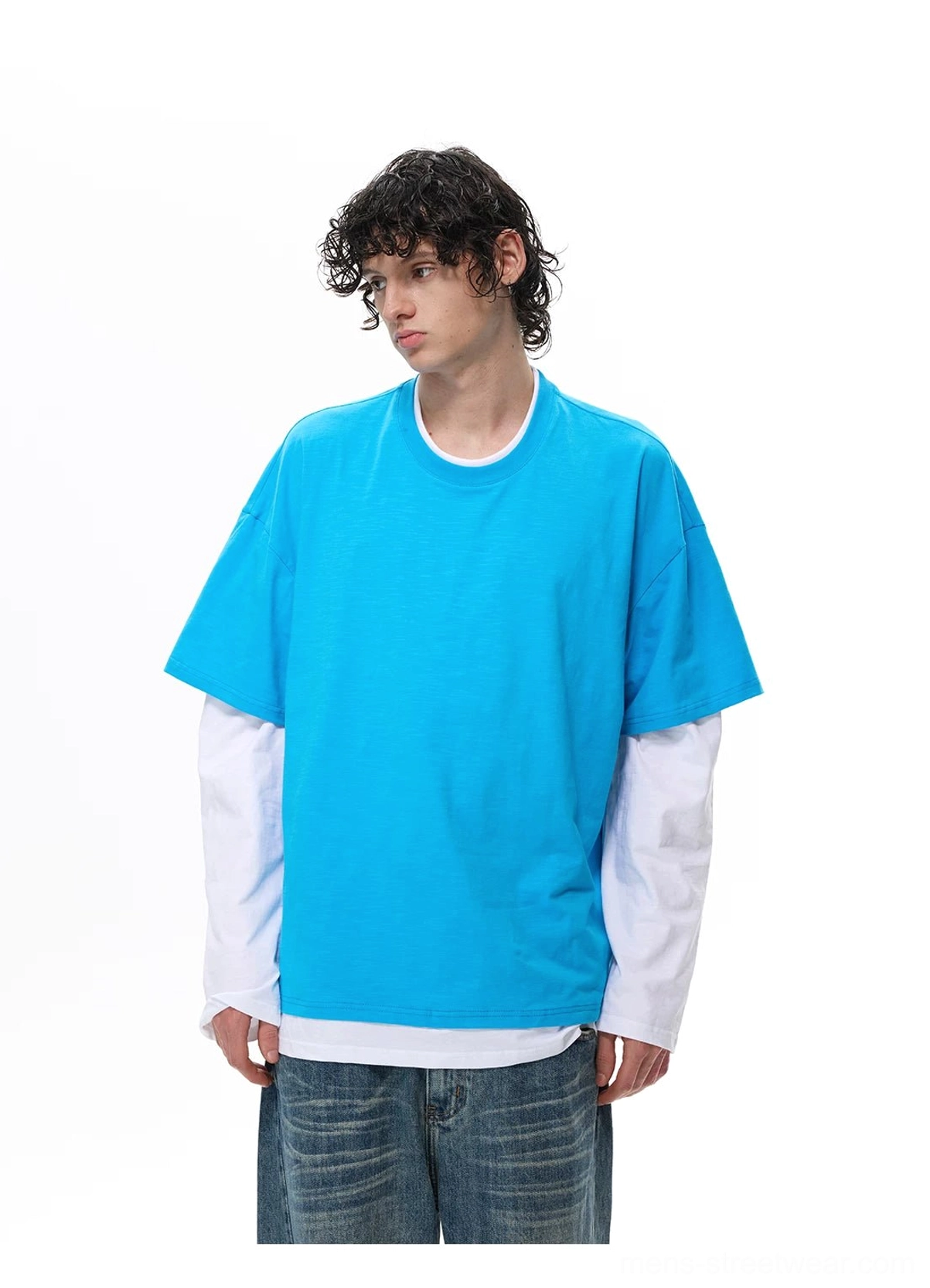 Faux two-piece color-blocked vest tee top featuring a crew neck, relaxed fit, and detachable outer vest detail