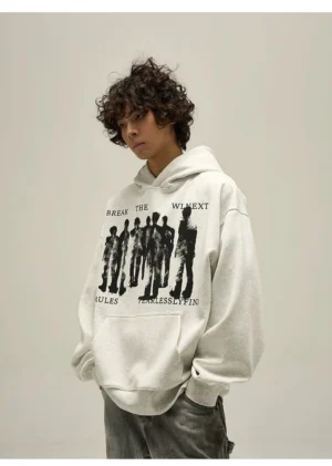 Heather gray washed oversized graphic hoodie three-quarter side view with dropped shoulders and front print