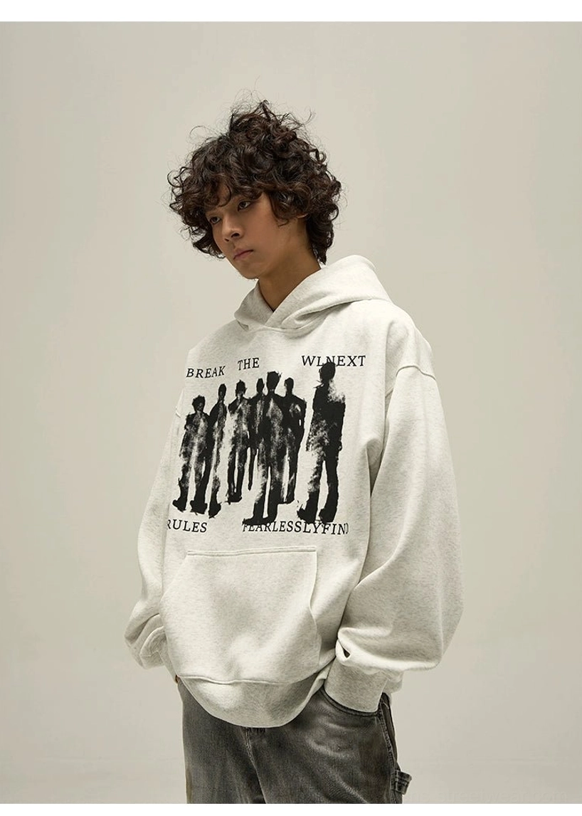Heather gray washed oversized graphic hoodie three-quarter side view with dropped shoulders and front print