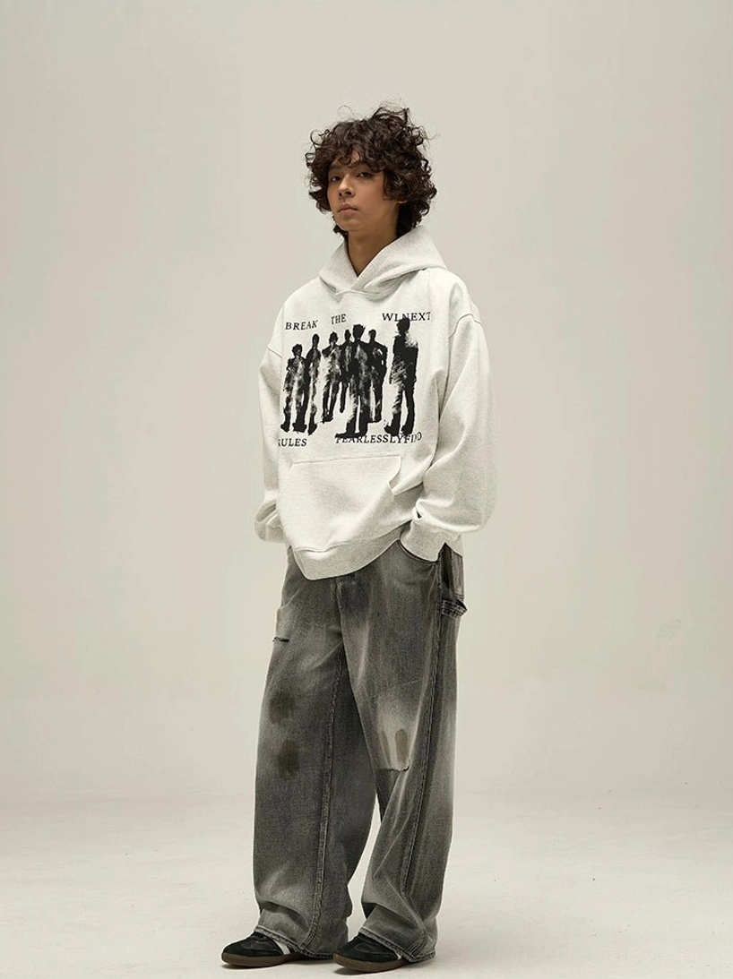 Heather gray fearless abstract figure oversized graphic hoodie front view styled with faded wide-leg jeans
