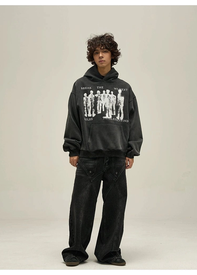Washed black fearless abstract figure oversized hoodie front view with contrasting white streetwear graphic