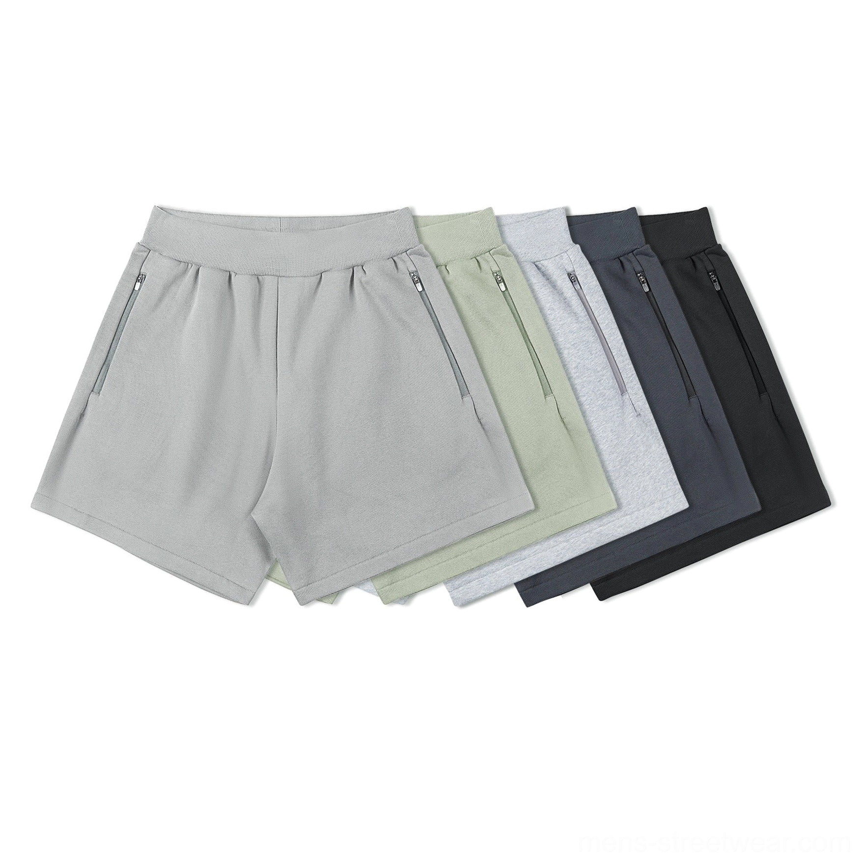 Five color collection of relaxed zip pocket sweat shorts in light gray, sage green, heather gray, dark charcoal, and black