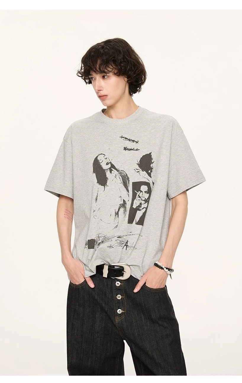 Floral gray Korean streetwear graphic T-shirt with relaxed silhouette and vintage portrait artwork worn with wide-leg black jeans