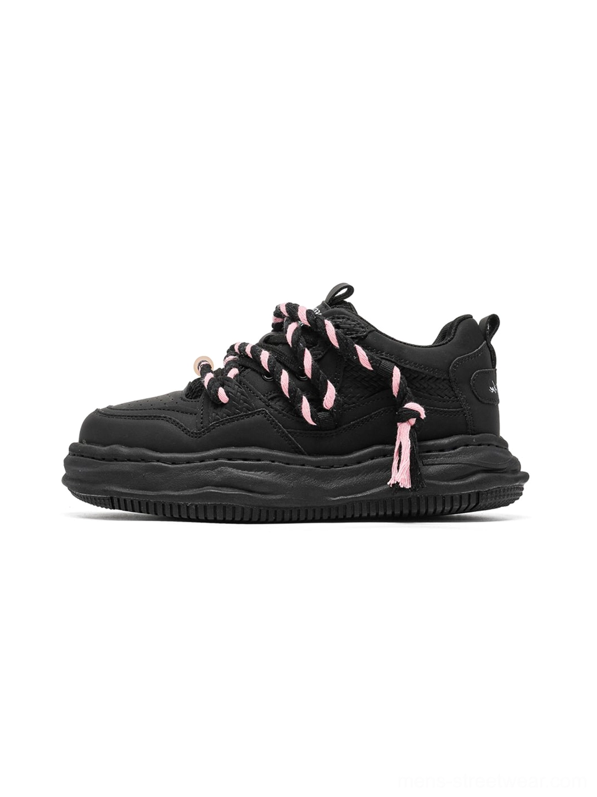Frayed canvas platform sneakers product image highlighting the textured canvas upper, twisted laces, and bold unisex streetwear silhouette