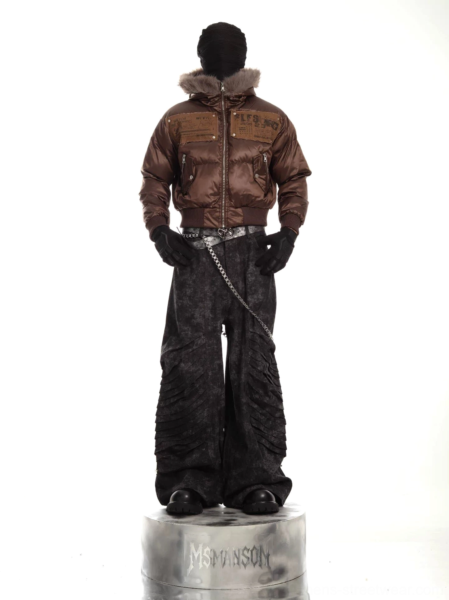 Coffee brown faux fur trimmed cropped puffer jacket back view showing quilted outerwear silhouette and ribbed hem