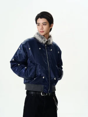 Side three-quarter view of a navy Korean streetwear bomber jacket with grey faux fur collar ribbed cuffs and front zipper