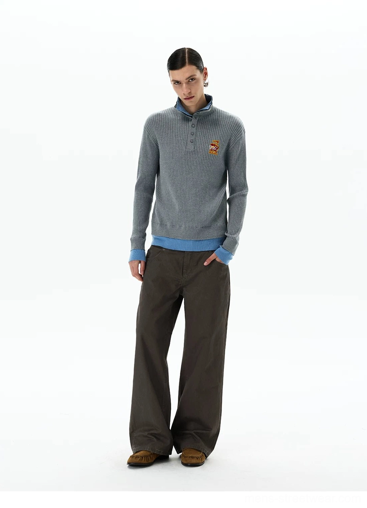 Three-quarter front view of men's grey cotton blend ribbed knit polo sweater with sky blue contrast collar and cuffs