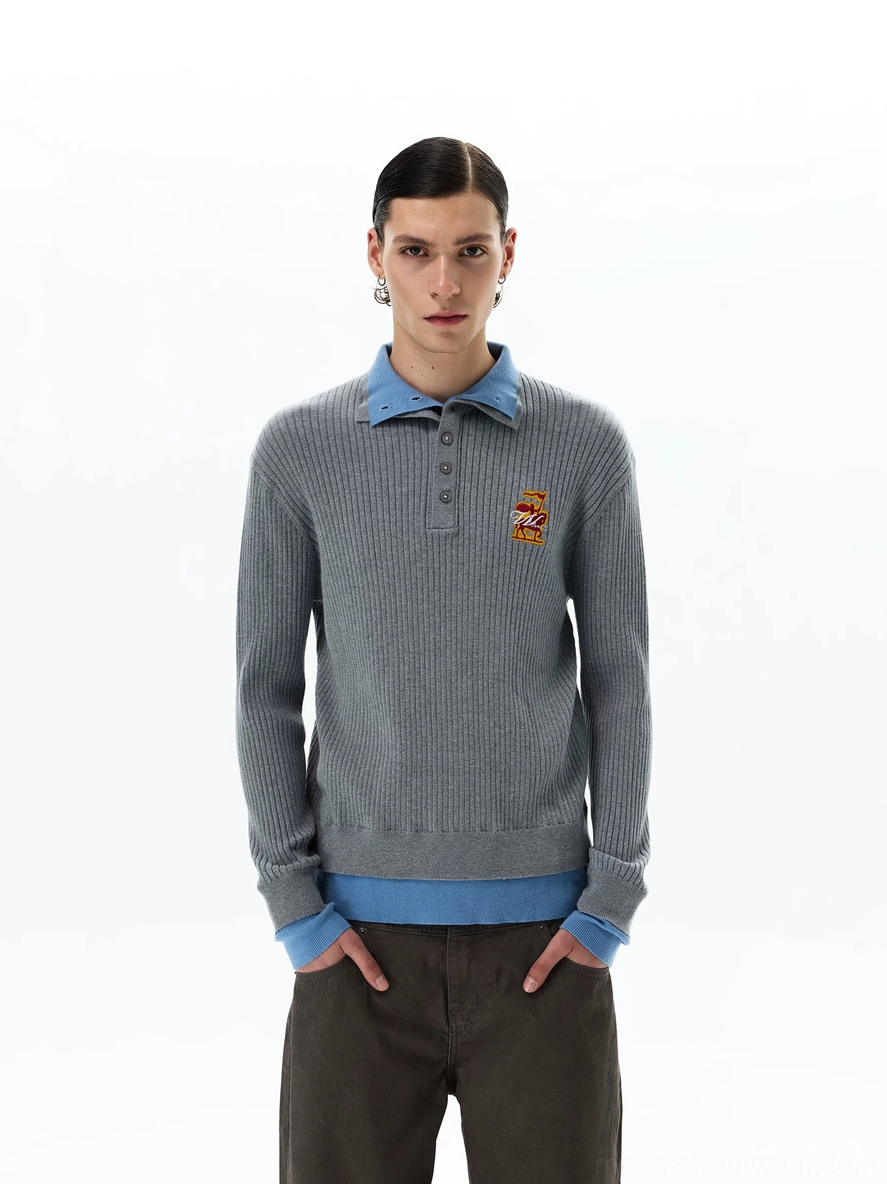 Men's heather grey layered rib knit polo sweater with sky blue collar cuffs and hem worn with brown wide-leg trousers front view