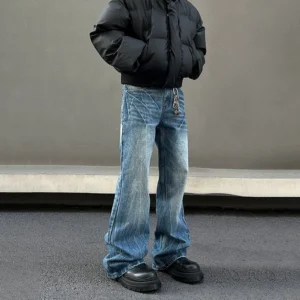 Frostline Vein distressed wide-leg blue denim jeans shown in a left side three-quarter streetwear outfit view