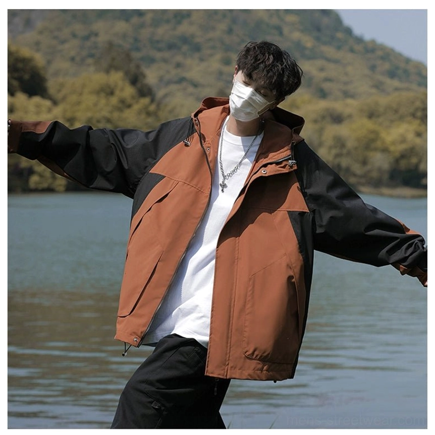 Functional colorblock techwear outer layer with water-resistant fabric, hood, and oversized cargo pockets