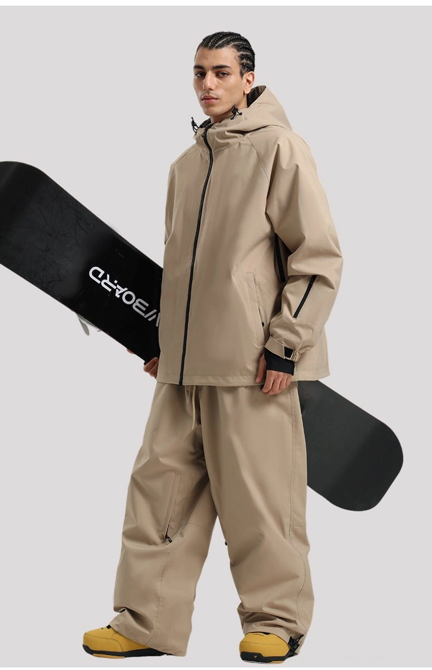 Functional hooded snowboard jacket with two-way front zipper, roomy fit, and gorpcore-inspired utility design