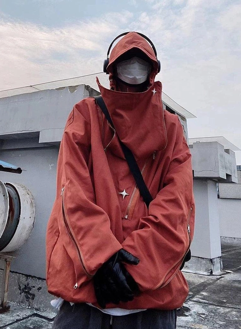 Functional tactical streetwear jacket with multiple metal zippers, spacious layering fit, high neck hood, and utility design