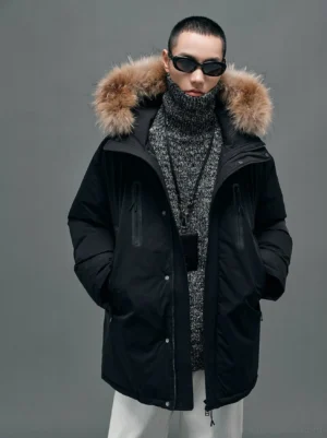 Black fur-collar hooded white duck down coat shown from the front three-quarter view on a male model in contemporary Seoul streetwear styling