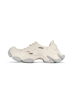 Off-white futuristic EVA platform clogs with sculpted ventilation cutouts and chunky rugged sole side view