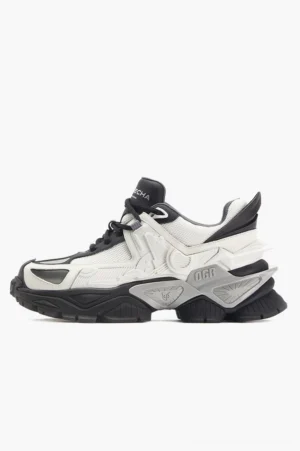 Right side view of futuristic mecha platform sneakers showing layered panels, breathable mesh construction, and textured techwear outsole