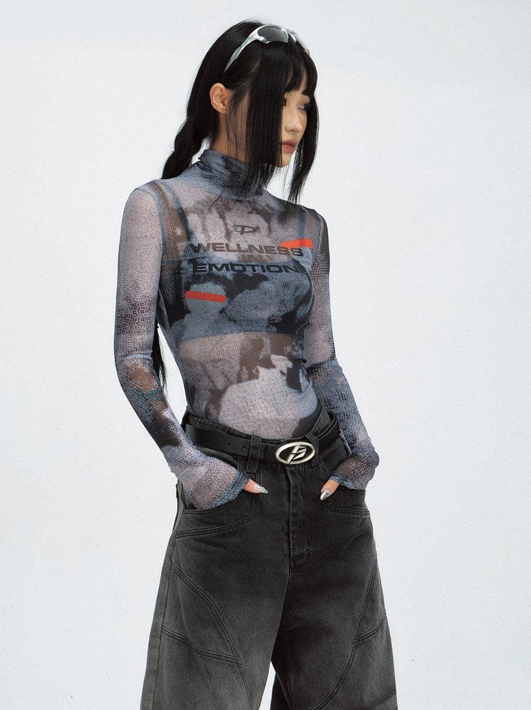 Side view of a fitted futuristic mesh turtleneck sweatshirt showing the long sleeves and sleek streetwear silhouette