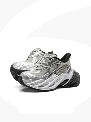 Futuristic metallic silver platform runner sneakers with breathable mesh upper and black sculpted outsole on a white background