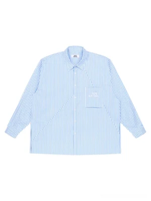 Light blue geometric panel stripe oversized shirt shown in a flat lay front view with point collar button closure and oversized chest pocket