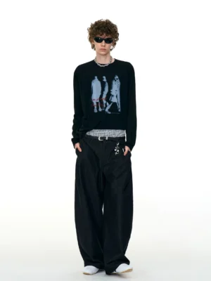 Full body model wearing a black Ghost Walkers graphic long sleeve tee with red script, wide-leg pants, and Seoul streetwear styling