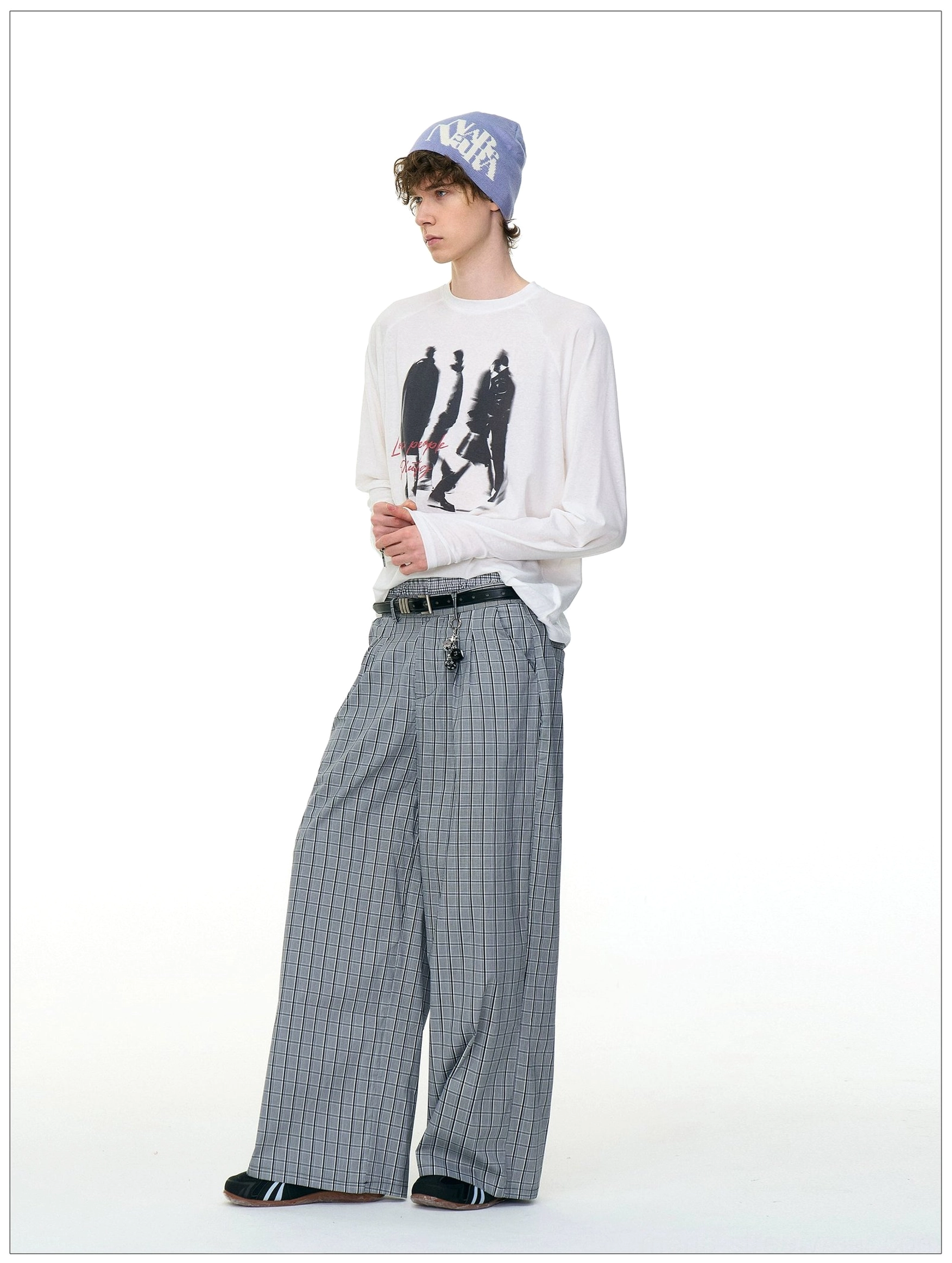 White Ghost Walkers shadow graphic long sleeve tee styled with pinstripe wide-leg trousers for a Korean street fashion outfit
