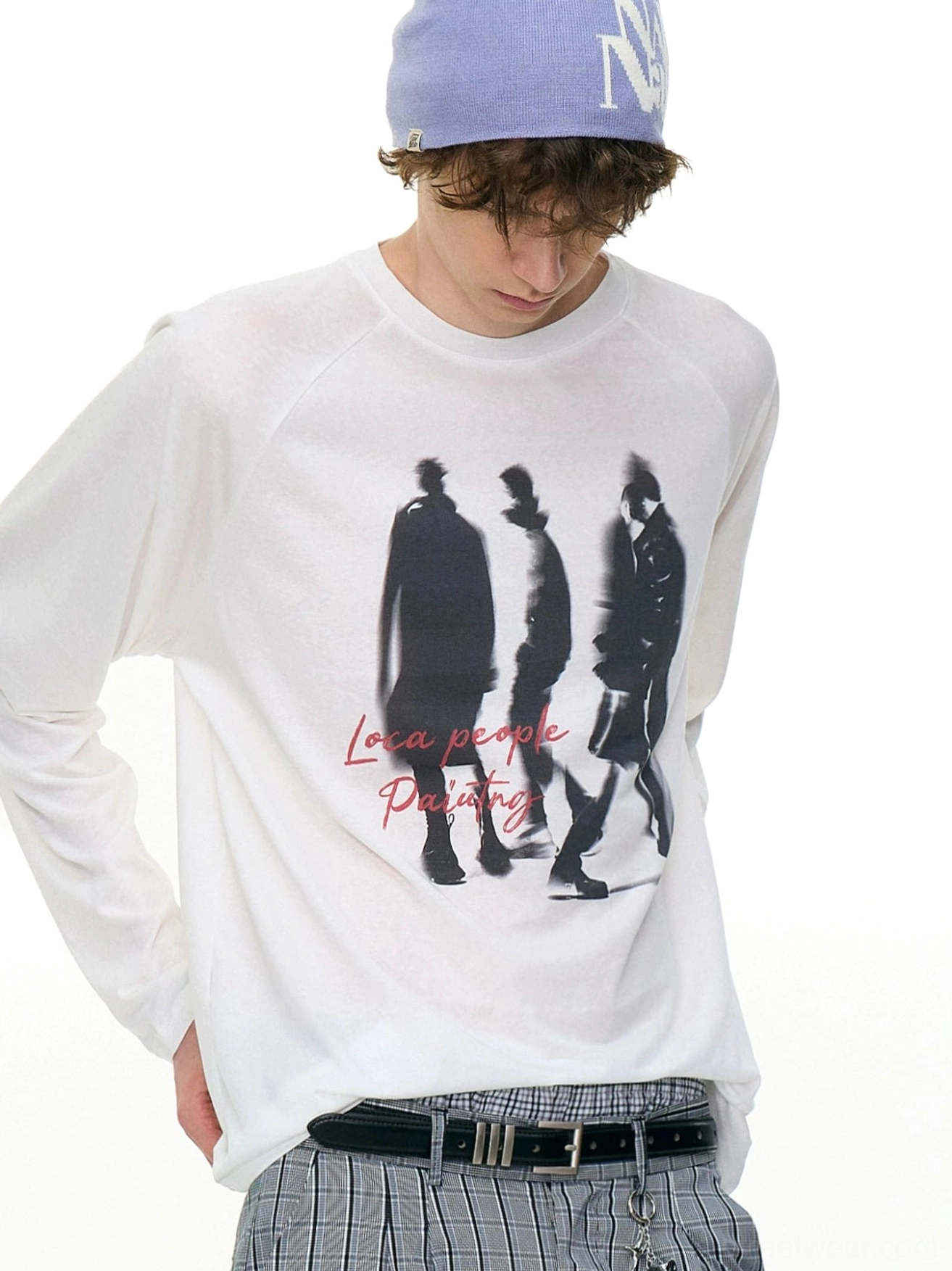 Three-quarter view of a white Ghost Walkers shadow graphic long sleeve shirt with relaxed fit and red streetwear lettering