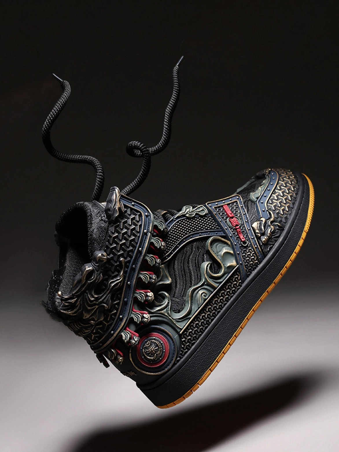 Black armor-inspired high-top streetwear sneakers with furry inner collar, thick laces, and decorative metal panels on a dark studio background