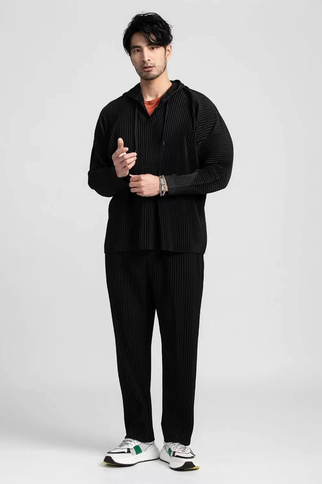 Men's Glacier Wave pleated hoodie product image highlighting all-over vertical texture, generous hood, and relaxed everyday fit