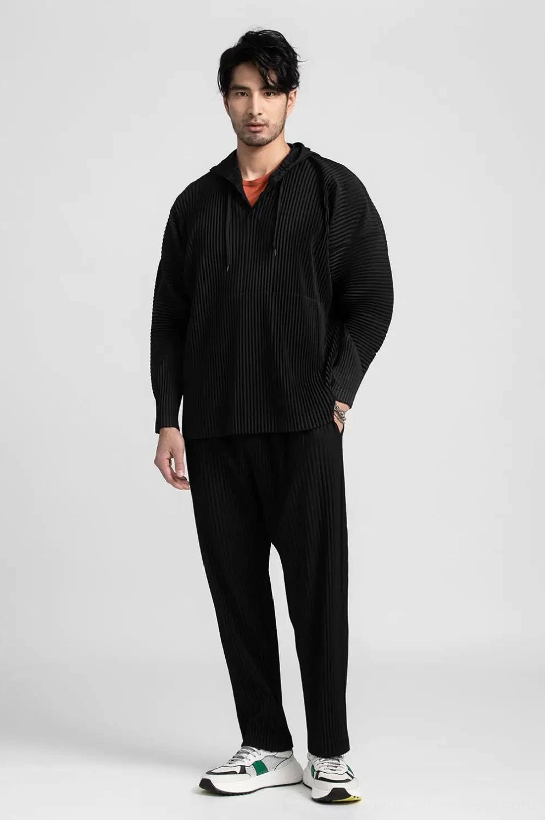 Glacier Wave pleated hoodie and coordinated trousers product image showcasing relaxed volume and minimalist monochrome fashion