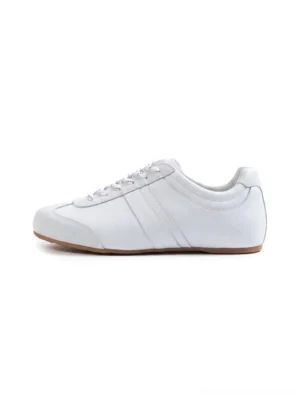 White gloss-finish suede leather low-profile retro trainer in a clean frontal studio view