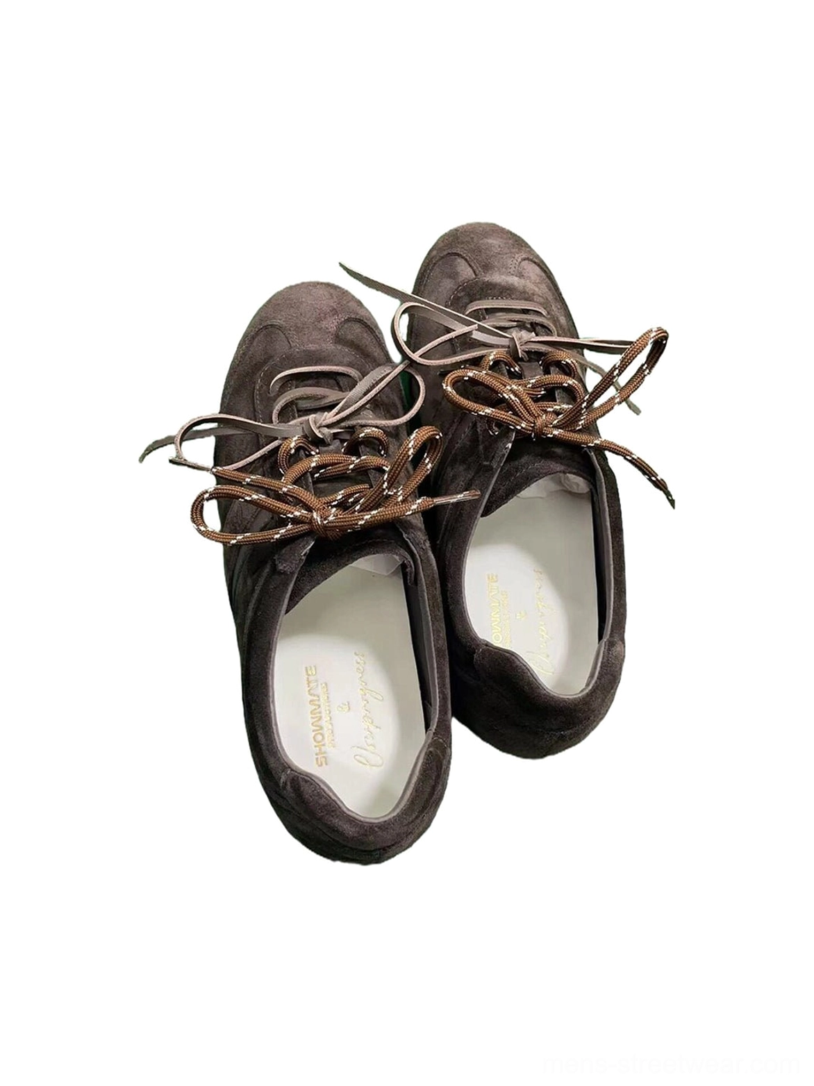 Pair of dark brown suede leather low-profile retro trainers shown from above with visible insoles