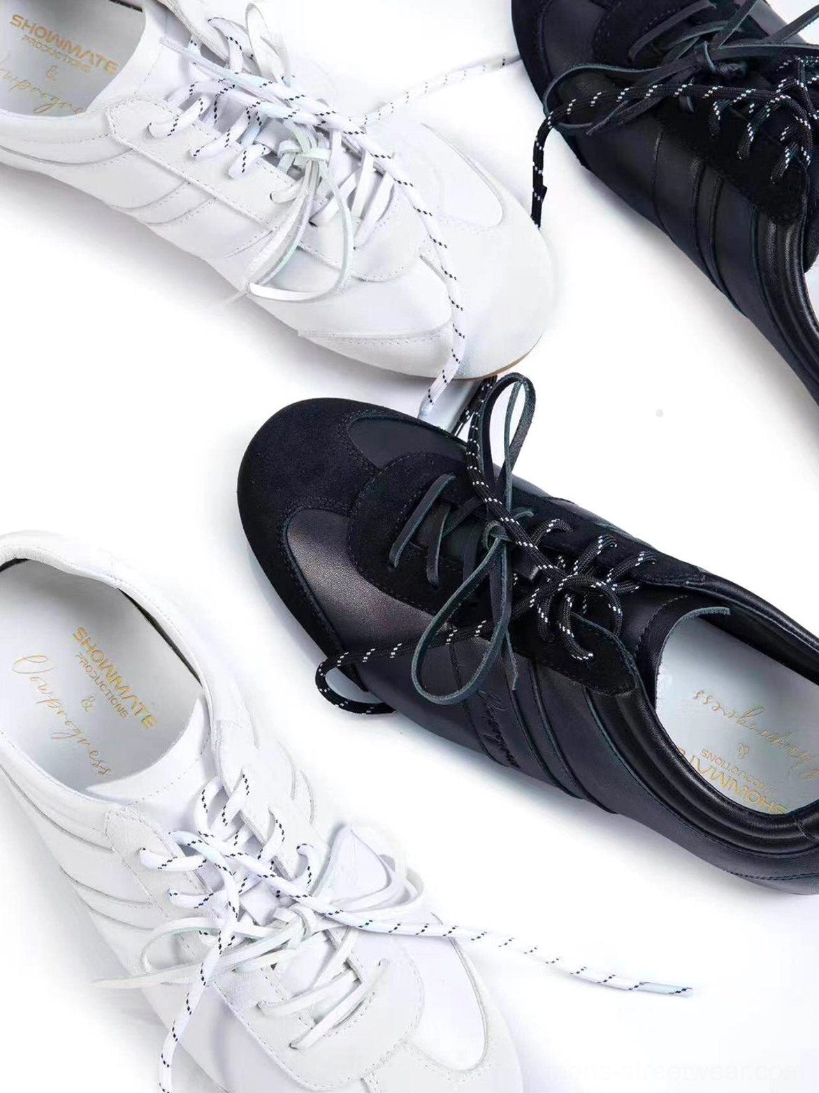 Gloss-finish suede leather low-profile retro trainers showcasing the streamlined lace-up profile